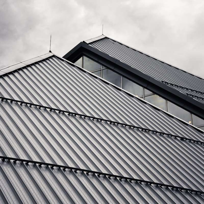 Standing seam metal roof panels on a commercial roofing St Louis project