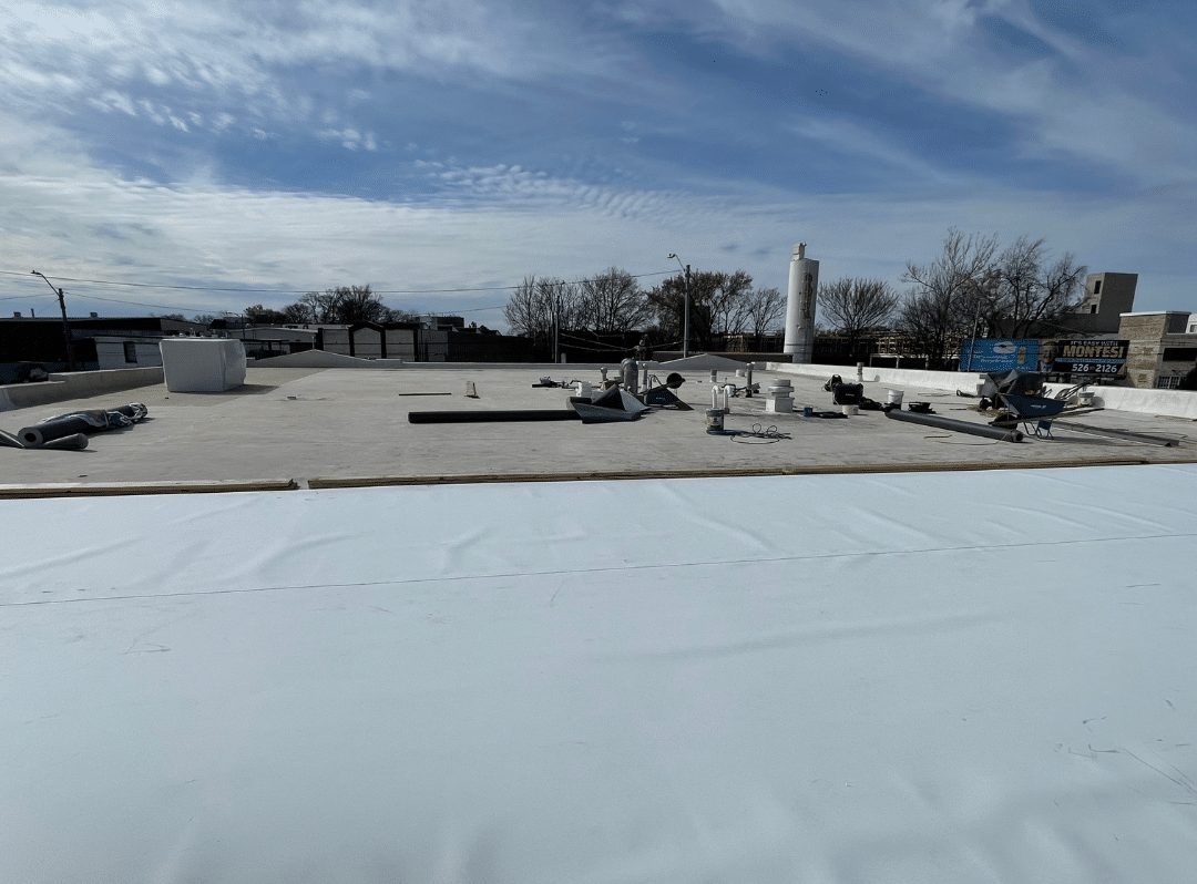 TPO membrane installation on a commercial roofing St Louis flat roof